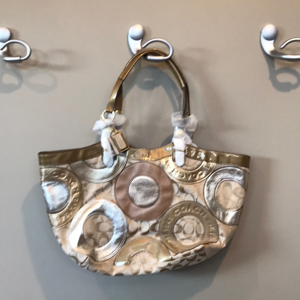 Coach tote. Gold silver and bronze leather.